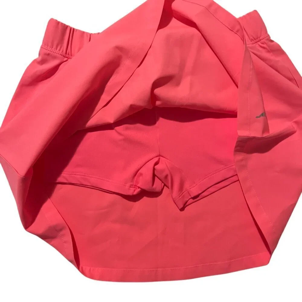 PUMA skirt-short set for girls, size L in pink and beige. Made in Cambodia.